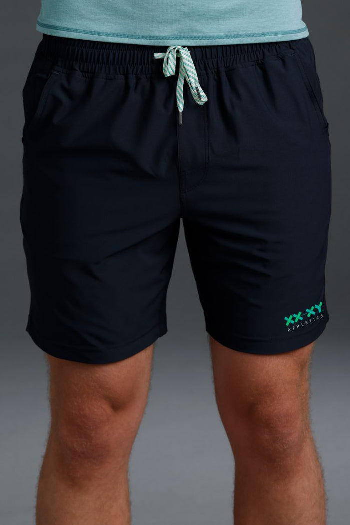 Black shorts with a logo on a gray background || Black