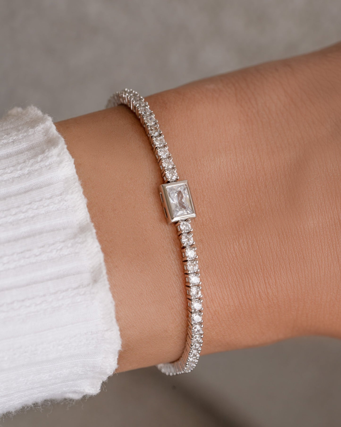 Bezeled Emerald-Cut Charm Tennis Bracelet