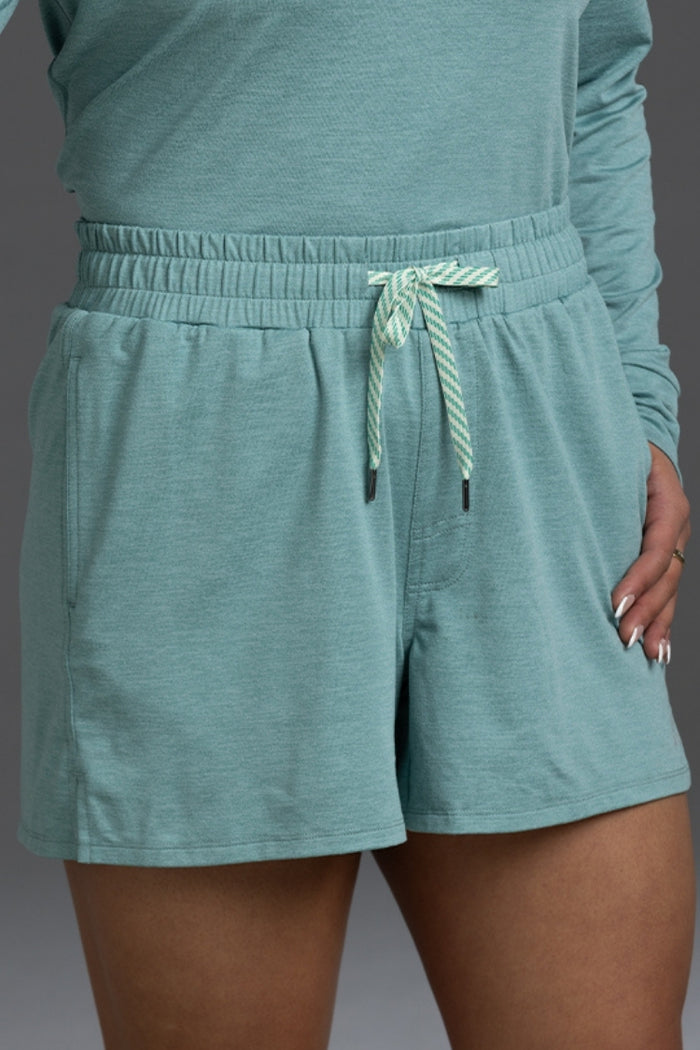 Teal shorts with a drawstring on a plain background || Underseas