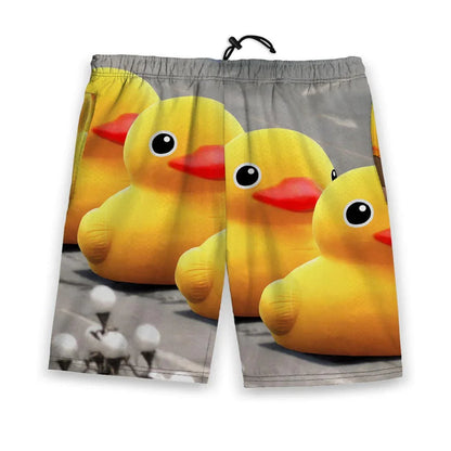 These men's gym shorts showcase a satirical convoy of three gigantic yellow rubber duckies marching down an urban street, their glossy orange bills and innocent black eyes dominating the composition. Contact us with accessibility feedback, we'd love to help!