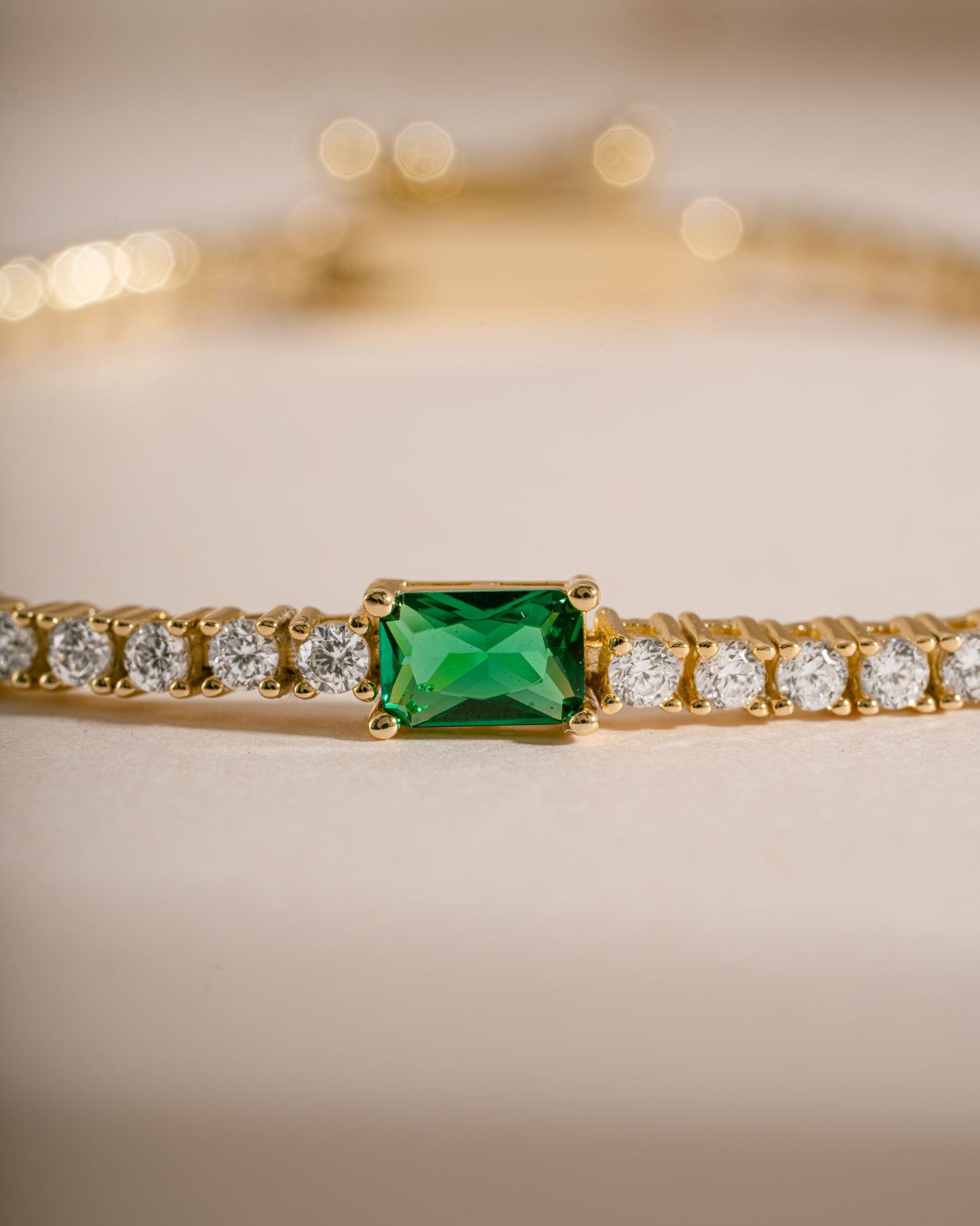 Tennis Bracelet with Emerald Baguette Charm